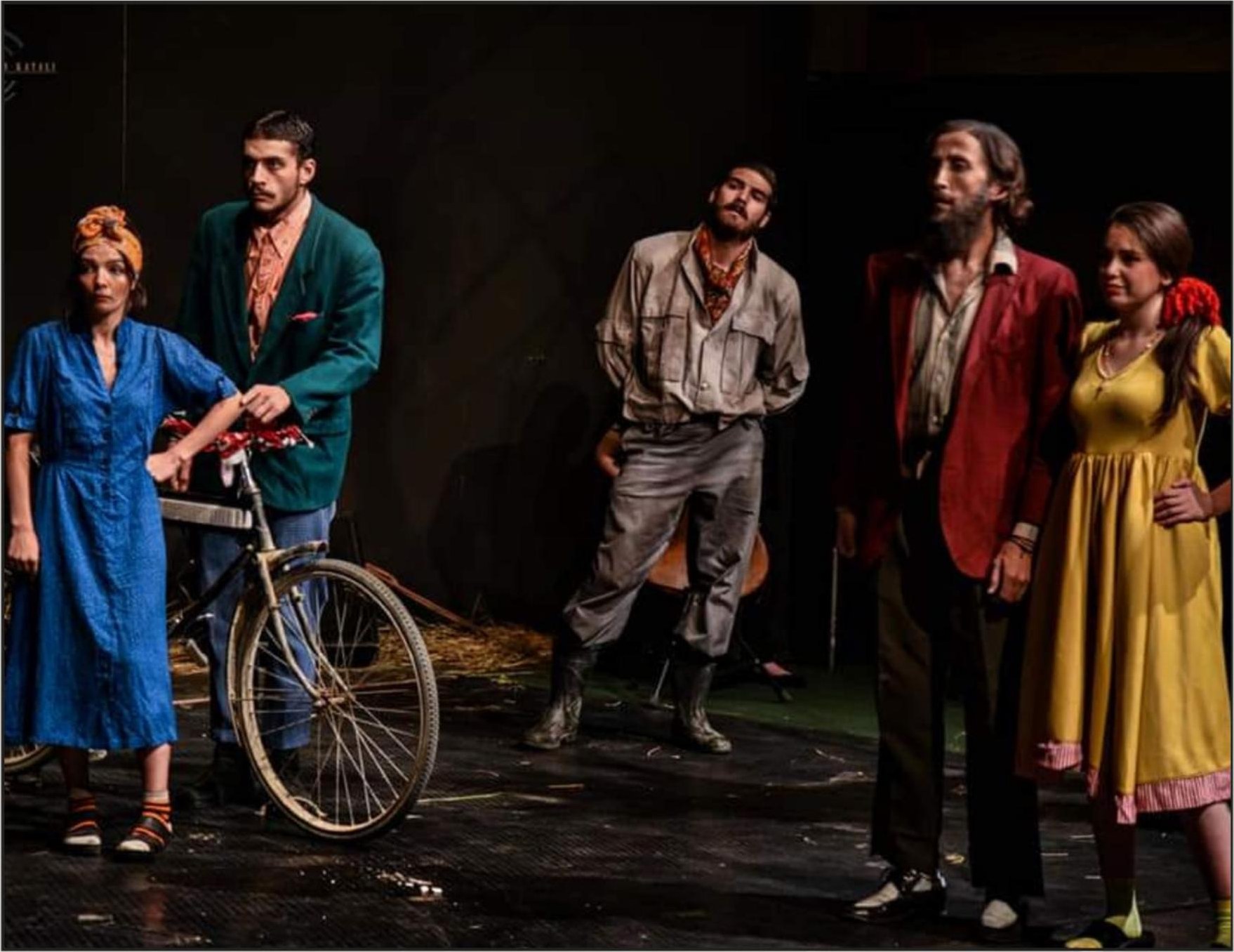 Full ensemble of characters in period costume on stage, styled by LLH Studio
